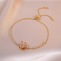 Pulsera con movimiento flor rosada