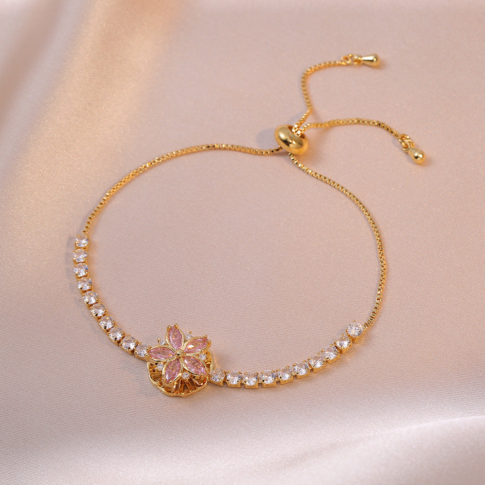 Pulsera con movimiento flor rosada