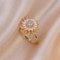 Anillo giratorio de girasol blanco