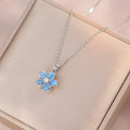 Collar de flor azul con movimiento