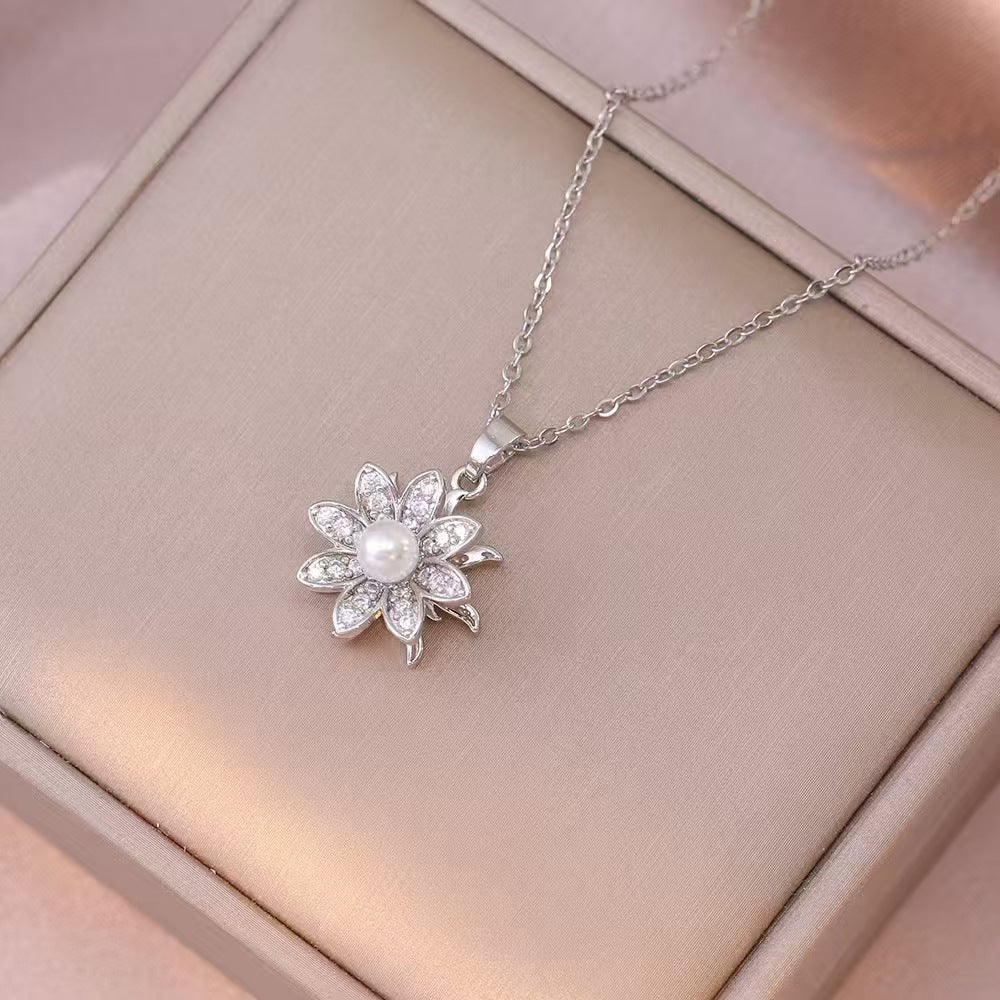 Flor plateada collar con movimiento